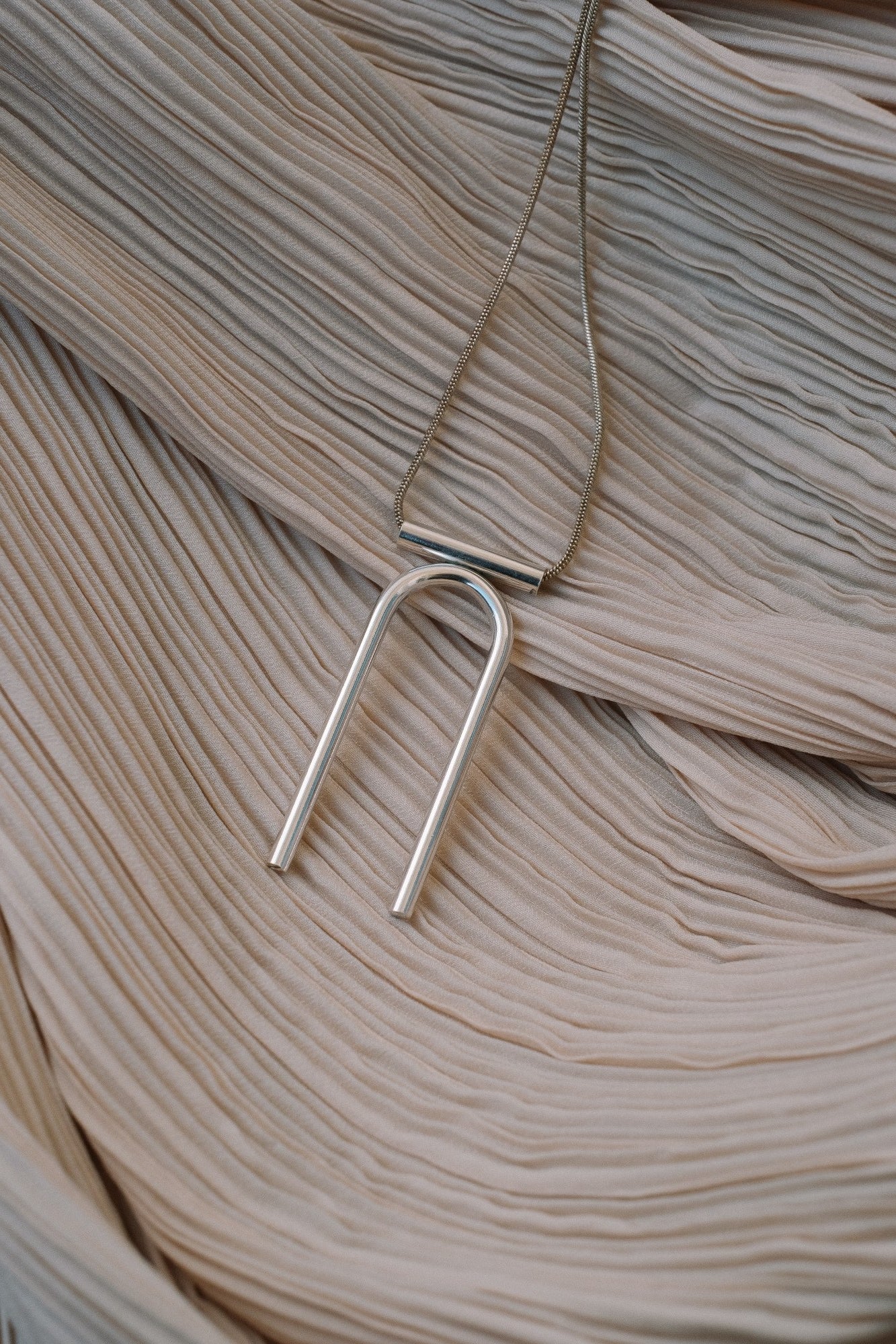 U necklace