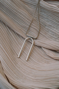 U necklace
