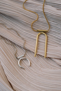 U necklace